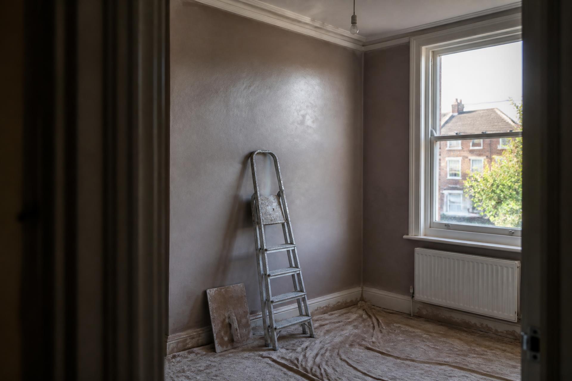 Freshly plastered bedroom in a Victorian terrace, drying in afternoon light
